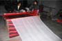 The vertical long flags (Tib. darchen) being manufactured in Sichuan by our Chinese contractors