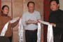 Tsering Yangkyi, Deputy Head (left), and Lobsang Dawa, Head of Economic and Civil Administration of Yu Shu Tibetan Autonomous Region, receiving substantial contribution through Tashi Jamyangling towards the cost of Ling Gesar statue.
