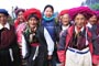 Genyen Jamyangling with local Tibetan women dressed in their traditional costume