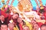 His Eminences Lhochen Rinpoche  and His Eminence Garchen Rinpoche doing a friendly pose in front of the Monlam Altar